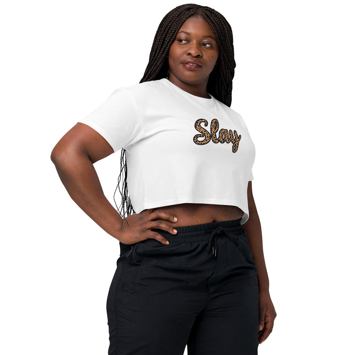 White Slay crop top styled with black high-waisted joggers
